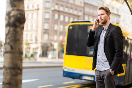 Young man on the streetの写真素材