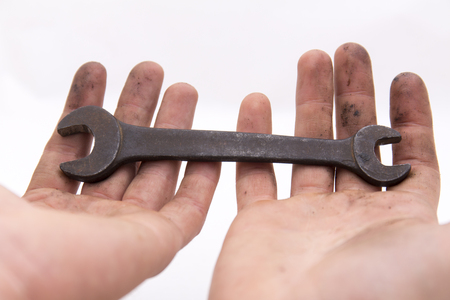 Wrench in the handの写真素材