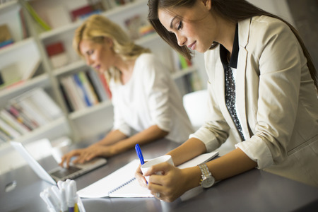 Young women in the officeの写真素材