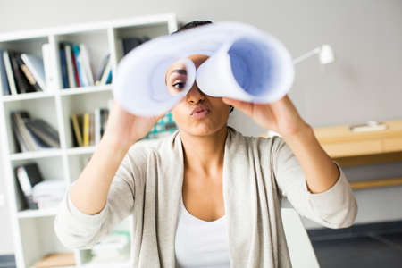 Young black woman in the officeの写真素材