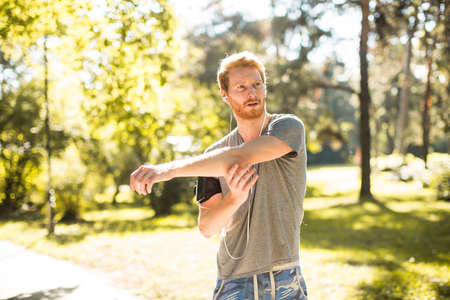 Young man resting outdoorの写真素材