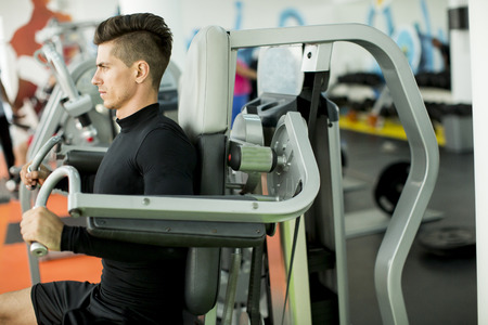 Young man training in the gym