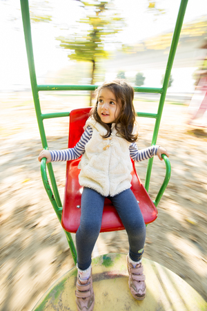 Little girl on the playgroundの写真素材