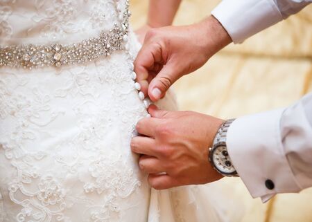 Bride and groom handsの写真素材