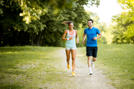 Young couple running