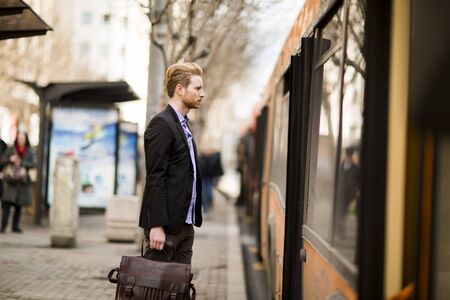 Young red hair man outdoorsの写真素材