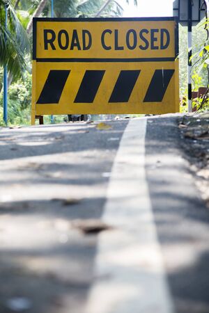 Road sign in Goa, Indiaの写真素材