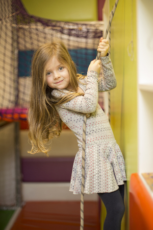 Little girl at the playgroundの写真素材