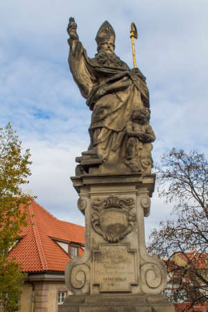 Statue of St. Anthony of Padua on Charles Bridge in Prague, Czech Republicの写真素材