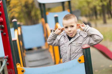 Little boy at playgroundの写真素材