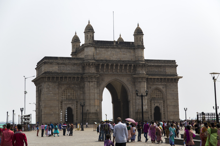 MUMBAI, INDIA - OCTOBER 9, 2015: Unidentified people ba Gateway of India in Mumbai. This is a monument built at 1924 by architect George Wittet,のeditorial素材