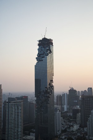 BANGKOK, THAILAND - FEBRUARY 14, 2016: View at MahaNakhon skyscraper in Bangkok, Thailand. It is a luxury 77 floor  skyscraper currently under construction in central business area of Bangkok.のeditorial素材