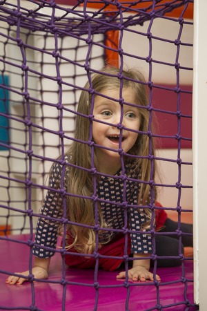 Little girl at the playgroundの写真素材