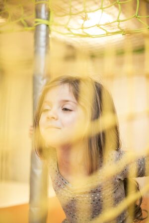 Little girl at the playgroundの写真素材