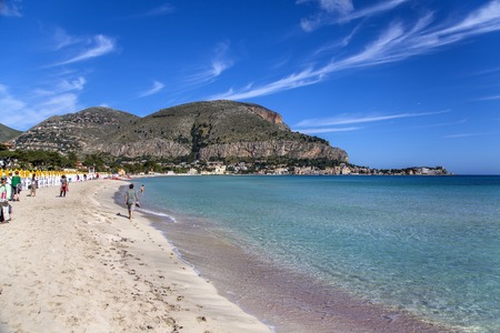 MONDELLO, ITALY - MAY 1, 2014: Unidentified people at the beach of Mondello at Sicily.  At the end of the 19th century Mondello grew into a favourite tourist destinationのeditorial素材