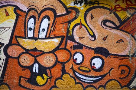 BELGRADE, SERBIA - JULY 24, 2014: Graffiti on the walls in Savamala in Belgrade. Project Red Bull Door Deco; transforms old and decayed doors at Savamala into creative field for the graffiti artistsのeditorial素材