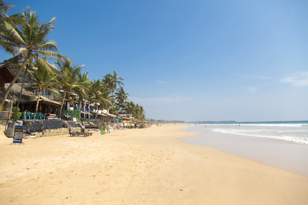 HIKKADUWA, SRI LANKA - JANUARY 22, 2014: Unidentified people on the beach at Hikkaduwa. Hikkaduwa's beach and night life make it a popular tourist destination.のeditorial素材