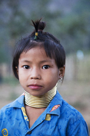 CHIANG MAI, THAILAND - FEBRUARY 01, 2016: Unidentified girl from Karen Long Neck Village near Chiang Mai, Thailand. This village is a part of very popular Hill tribe tourism in Thailand.のeditorial素材