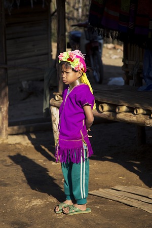 CHIANG MAI, THAILAND - FEBRUARY 02, 2016: Unidentified girl from Karen Long Neck Village near Chiang Mai, Thailand. This village is a part of very popular Hill tribe tourism in Thailand.のeditorial素材