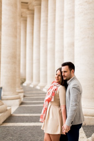 Loving couple at the St. Peter's Square in Vaticanの写真素材