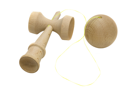 Closeup of the traditional Japanese toy Kendama on whiteの写真素材