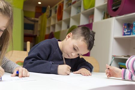 Children drawing at playroomの写真素材