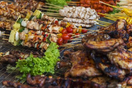 View of skewers of chicken in Thailandの写真素材