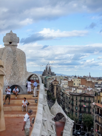 BARCELONA, SPAIN - SEPTEMBER 9, 2014: Unidentified people on the Casa Mila roof in Barcelona, Spain. Casa Mila is modernist building, built between 1906 and 1910 and designed by catalan architect Antoni Gaudi.のeditorial素材
