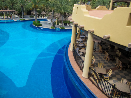 CABO SAN LUCAS, MEXICO - AUGUST 8, 2014: Unidentified people at RIU Santa Fe Hotel at Cabo San Lucas, Mexico. It is a 5 star hotel at Baja California with 902 guest rooms.のeditorial素材