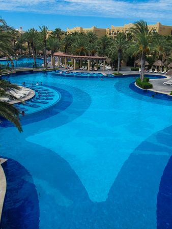 CABO SAN LUCAS, MEXICO - AUGUST 8, 2014: Unidentified people at RIU Santa Fe Hotel at Cabo San Lucas, Mexico. It is a 5 star hotel at Baja California with 902 guest rooms.のeditorial素材