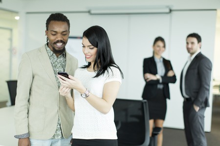 Young multiracial business people working together in the officeの写真素材