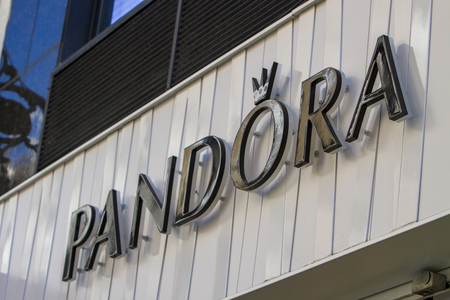 MADRID, SPAIN - MARCH 17, 2016: The sign for a Pandora jewellery store in Madrid, Spain. Pandora is an international Danish jewelry manufacturer and retailer founded in 1982.のeditorial素材