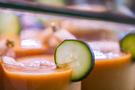 Close up detail view at delicious and fresh carrot juice
