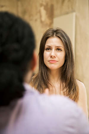 Young people working by the desk in the grunge officeの写真素材