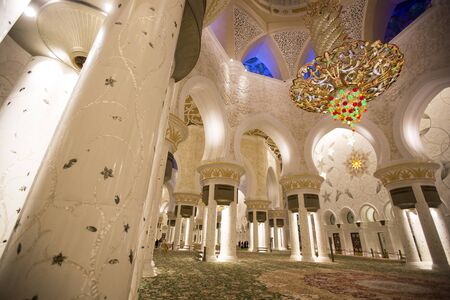 ABU DHABI, UAE - MAY 4, 2015: Interior of Sheikh Zayed Mosque in Abu Dhabi. Mosque was designed by Yusef Abdelki and opened at 2007.のeditorial素材