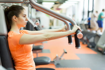 View of the young woman training in the gymの写真素材