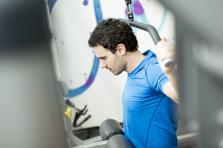 Young man training in the gym