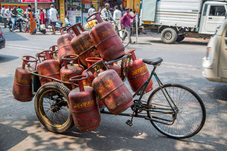 MUMBAI, INDIA - OCTOBER 9, 2015: Unidentified people on the street of Mumbai, India. With 12 million people, Mumbai is the most populous city in India and the 9th most populous agglomeration in the world.のeditorial素材