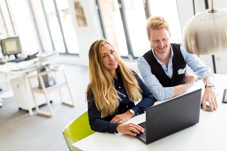 Young business people are in the office and working together