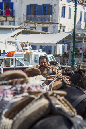 HYDRA, GREECE - AUGUST 29, 2016: Unindentified people at town Hydra on Hydra island in Greece. Hydra is one of the Saronic Islands of Greece.のeditorial素材