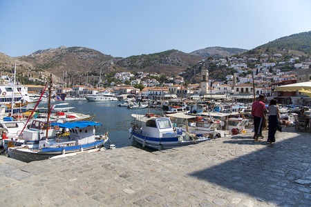 HYDRA, GREECE - AUGUST 29, 2016: Unindentified people at town Hydra on Hydra island in Greece. Hydra is one of the Saronic Islands of Greece.のeditorial素材