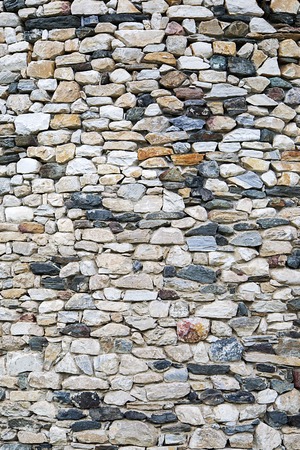 View of the stone wall as a backgroundの写真素材