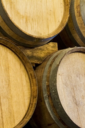 Close up view at lot of barrels in storage