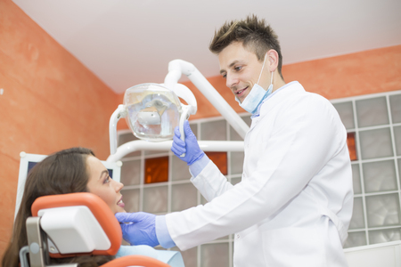 Young woman getting dental treatmentの写真素材