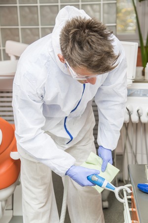 View at young man cleans dental clinicの写真素材