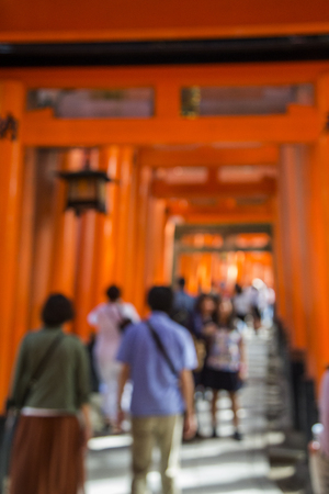 KYOTO, JAPAN - OCTOBER 8, 2016: Unidentified people at walkway in Fushimi Inari shrine in Kyoto, Japan. This popular shrine have 32,000 sub-shrines  throughout Japanのeditorial素材