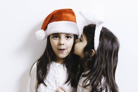 Two girls posing for Christmas and New Year holidaysの写真素材