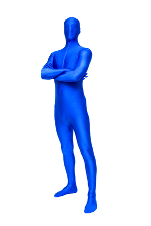 Mysterious blue man in morphsuit holding crossed arms isolated on whiteの写真素材