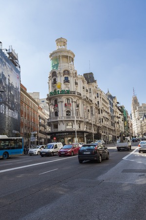 MADRID, SPAIN - MARCH 16, 2016: Exterior of the Edificio Grassy building in Madrid. It was built between 1916 and 1917. In 1981, the Edificio Grassy was immortalized by painter Antonio LÃ³pez in his hyperrealist masterpiece "La Gran VÃ­a".のeditorial素材