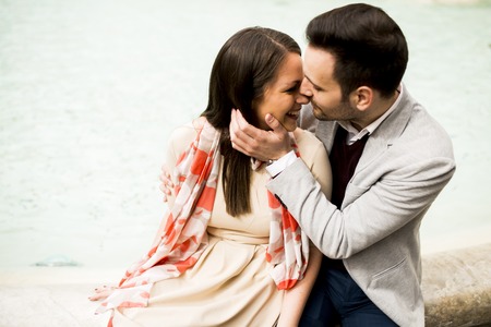Tourist couple on travel by Trevi Fountain in Rome, Italy.の写真素材